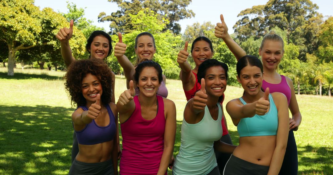 Diverse Group of Women Exercising Outdoors Giving Thumbs Up - Free Images, Stock Photos and Pictures on Pikwizard.com