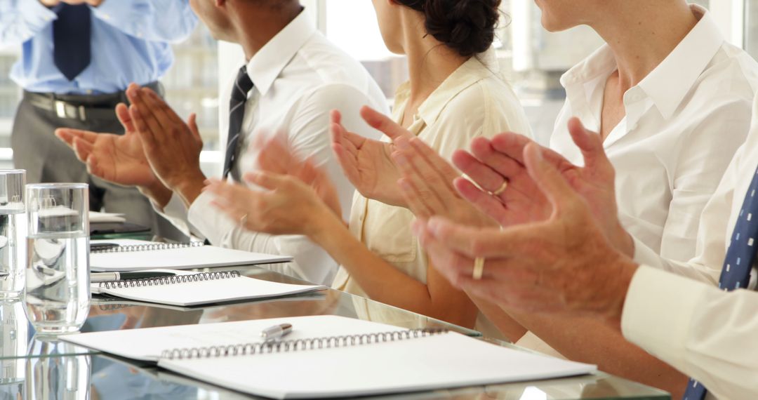 Business Team Clapping During Meeting - Free Images, Stock Photos and Pictures on Pikwizard.com