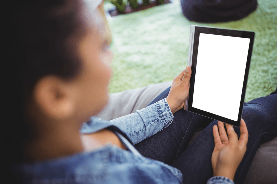 Woman Relaxing Holding Tablet with Blank Screen Transparent View