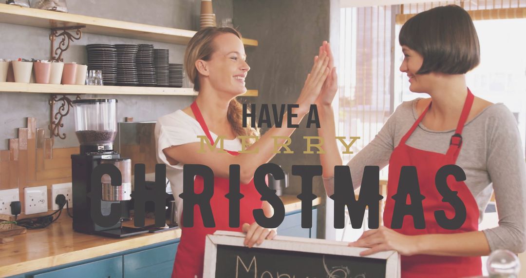 Baristas High-Fiving During Festive Café Service