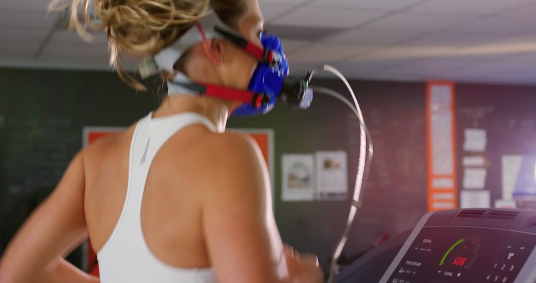 Woman Running on Treadmill with Mask in Fitness Test - Free Images, Stock Photos and Pictures on Pikwizard.com