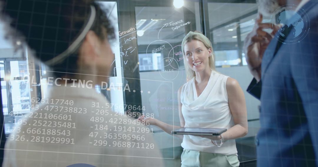 Diverse Team Analyzing Financial Data for Global Business Strategy