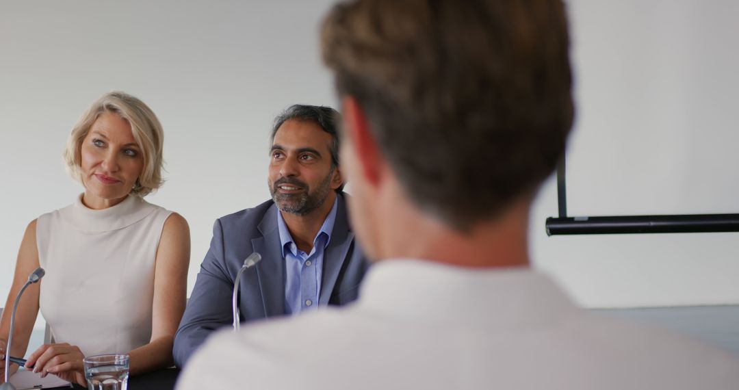 Diverse Business Delegates Responding at Conference