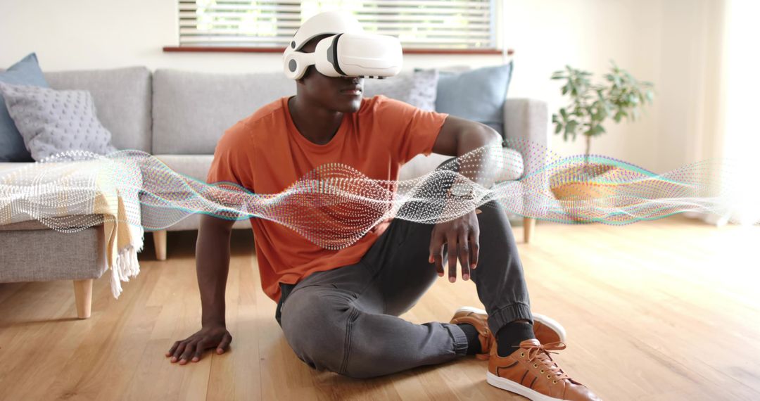 Man exploring virtual soundscape wearing VR headset in modern living room