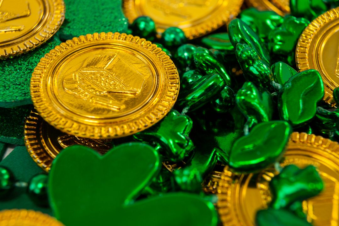 St. Patricks Day chocolate gold coins, beads and shamrocks - Free Images, Stock Photos and Pictures on Pikwizard.com