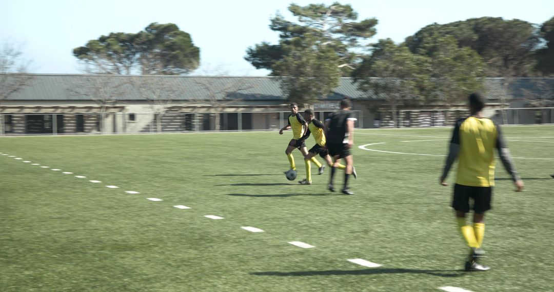 Soccer Player in Action Focusing on Ball Control During Match