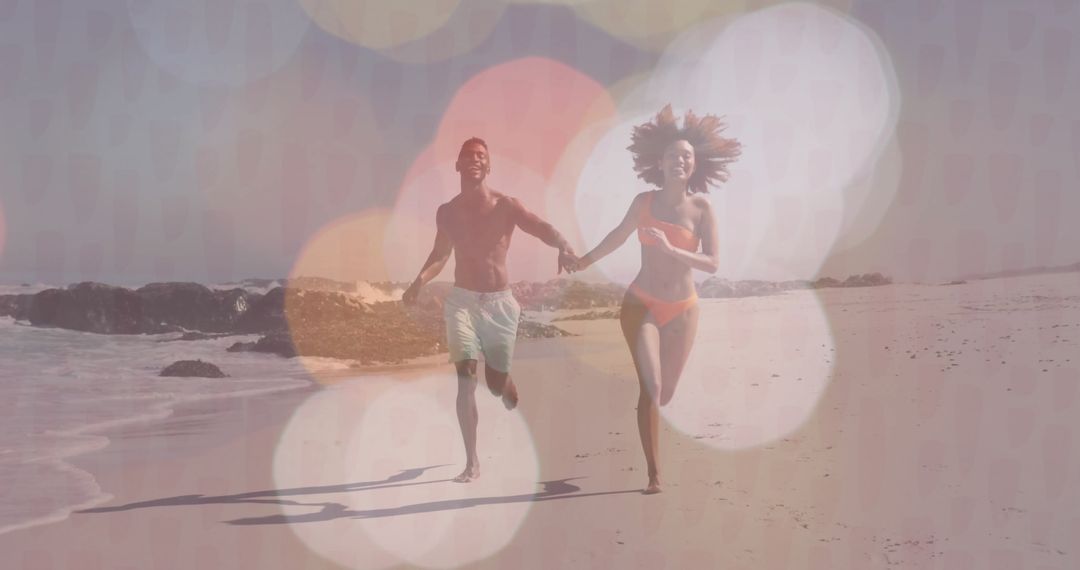 Joyful Couple Running on Beach During Vacation with Ocean Waves