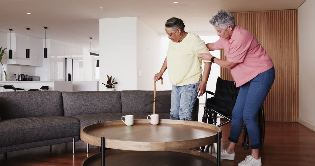 Senior Couple in Cozy Home Helping Each Other Walk