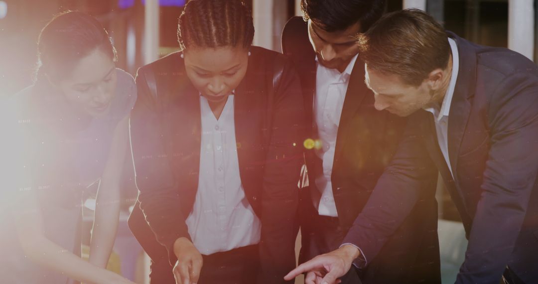 Diverse Team Collaborating Around Work Documents