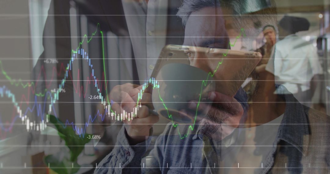 Focused Professional Analyzing Digital Charts Over Coffee Break