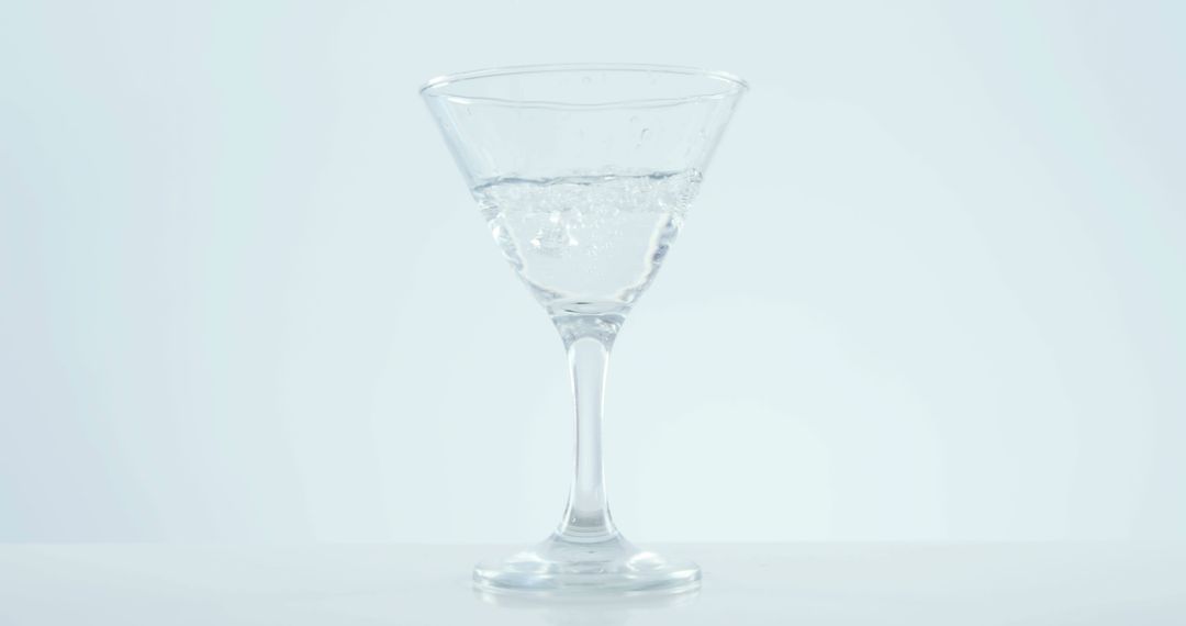 The image captures the essence of purity and minimalism as water fills an elegant glass. - Free Images, Stock Photos and Pictures on Pikwizard.com