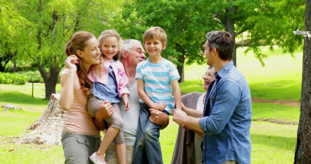 Multigenerational Family Enjoying Outdoor Picnic on Sunny Day - Free Images, Stock Photos and Pictures on Pikwizard.com