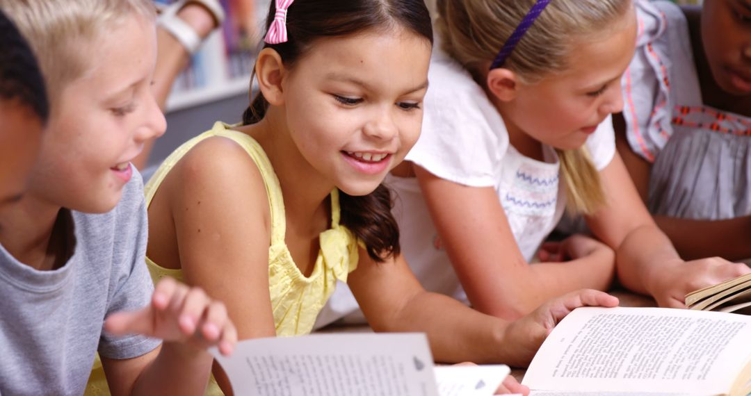 Children Happily Reading Books in School Library