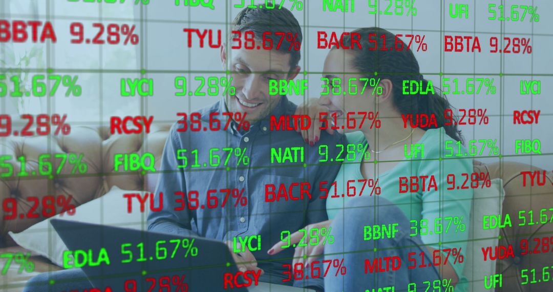Couple Analyzing Stock Market Data on Laptop