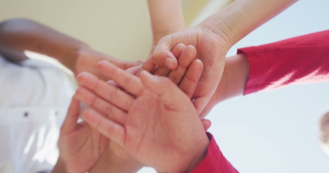 Diverse Group Stacking Hands in Unity - Free Images, Stock Photos and Pictures on Pikwizard.com