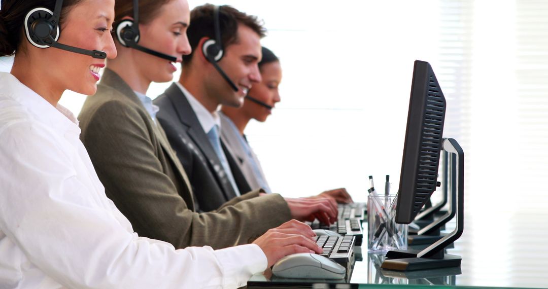 Customer Service Representatives with Headsets at Call Center - Free Images, Stock Photos and Pictures on Pikwizard.com