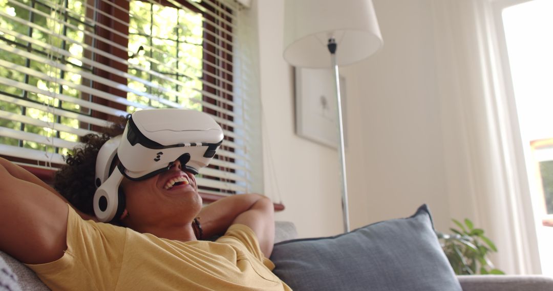 Relaxed Man Enjoying Virtual Reality at Home