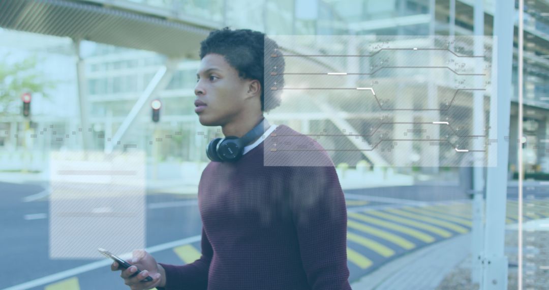 Innovative Technology with African American Man Using Smartphone