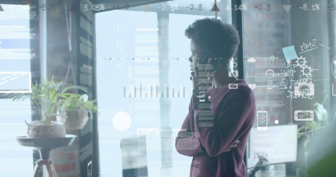 Businessman in Office Analyzing Data Hologram