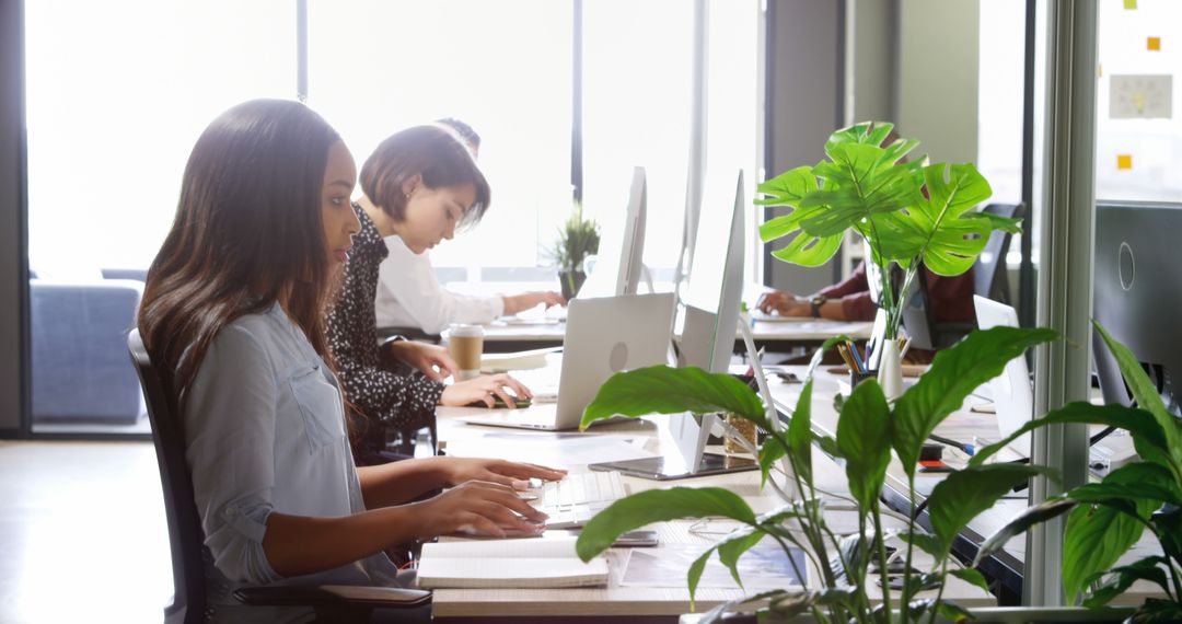 Multicultural Team Collaborating in Modern Office Setting