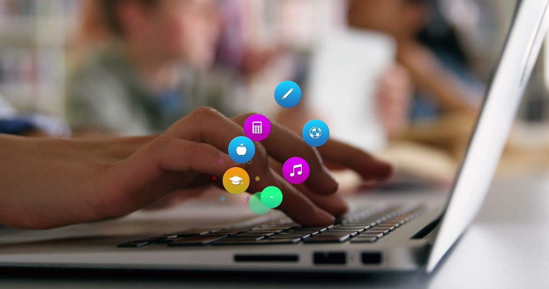 Digital Content Icons Hovering Above Typing Hands