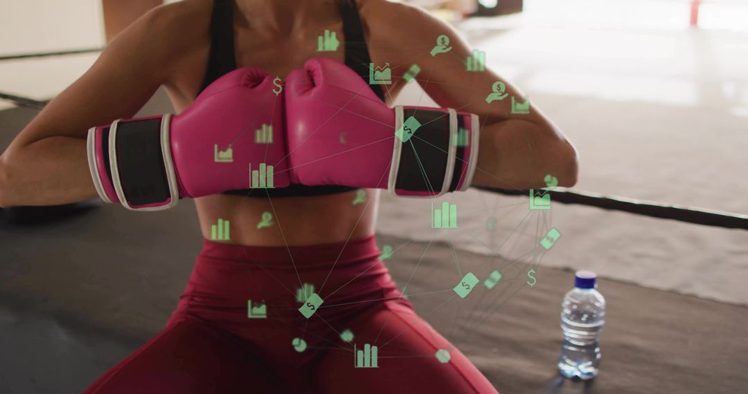 Boxer Analyzing Performance Data in Training Ring