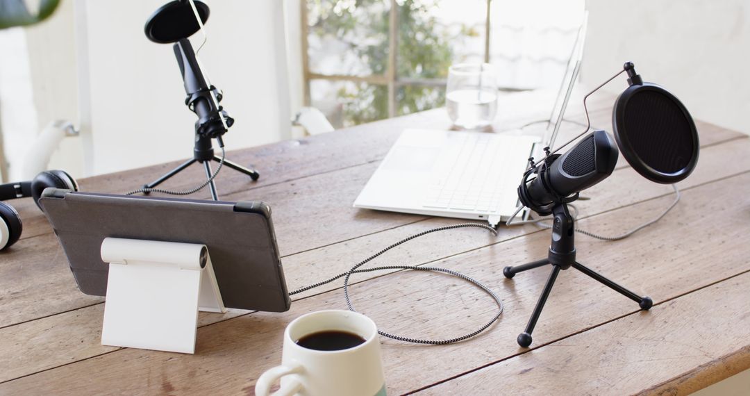 Modern Creative Podcast Studio Setup with Microphones and Devices