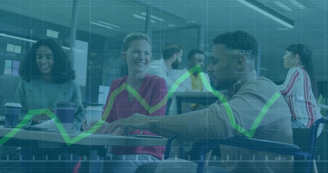 Diverse Team Analyzing Business Data in Open-Plan Office Setting