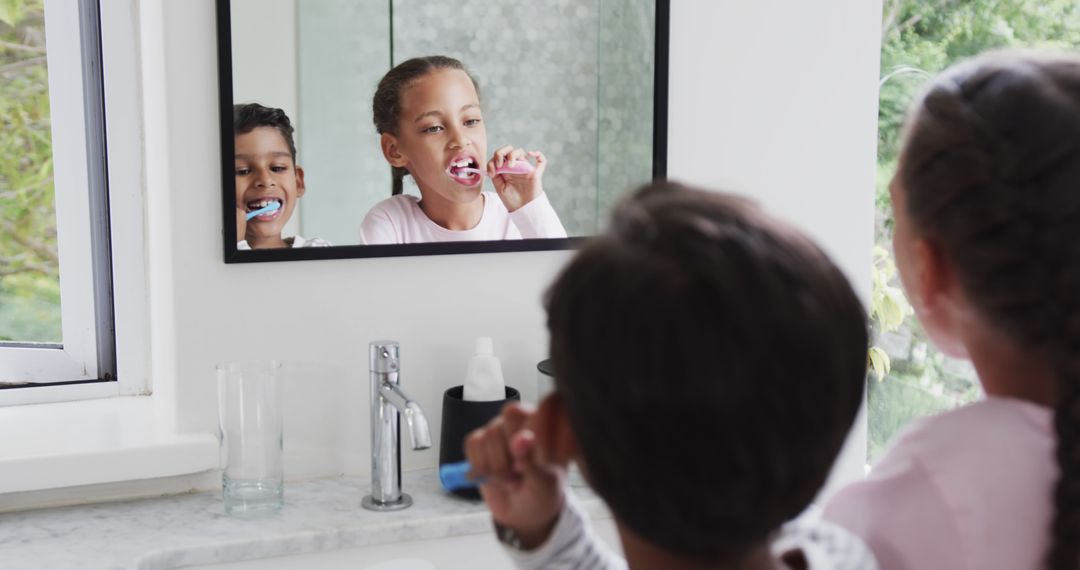 Children Brushing Teeth Together in Bathroom, Morning Routine - Free Images, Stock Photos and Pictures on Pikwizard.com