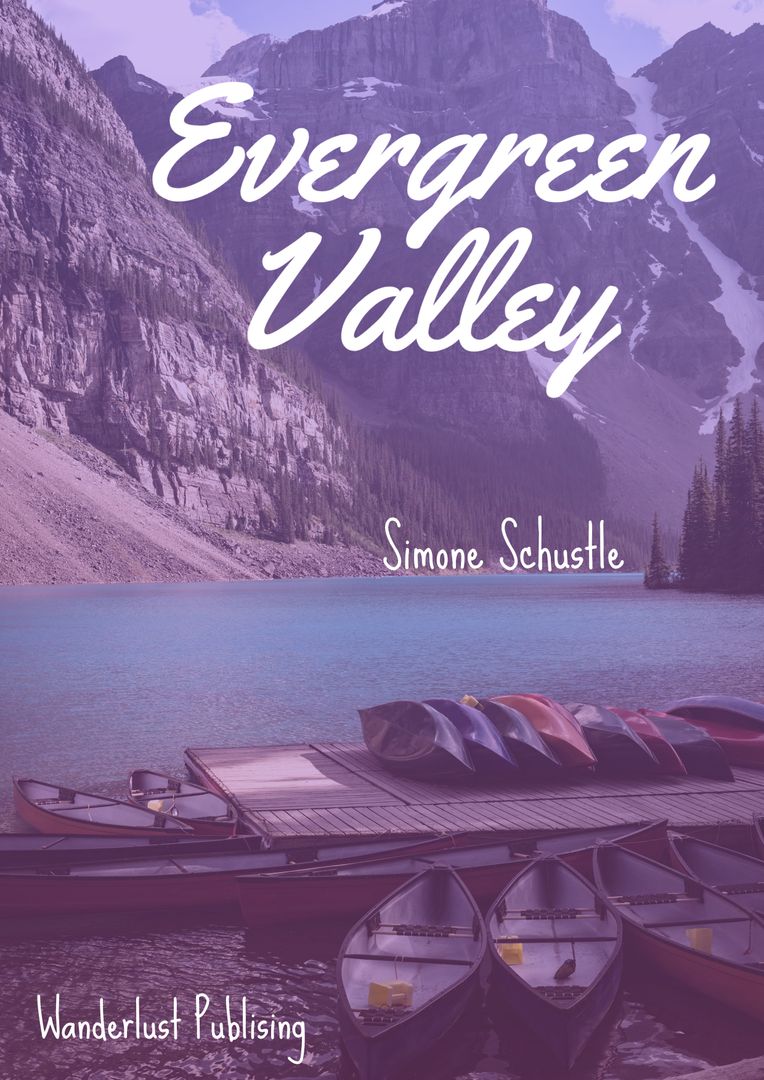 Canoes on Tranquil Lake in Majestic Mountain Valley