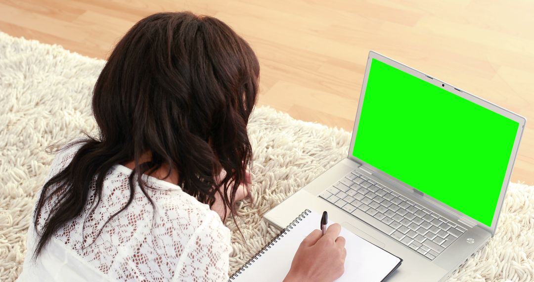 Woman Studying on Laptop with Green Screen in Cozy Room - Free Images, Stock Photos and Pictures on Pikwizard.com