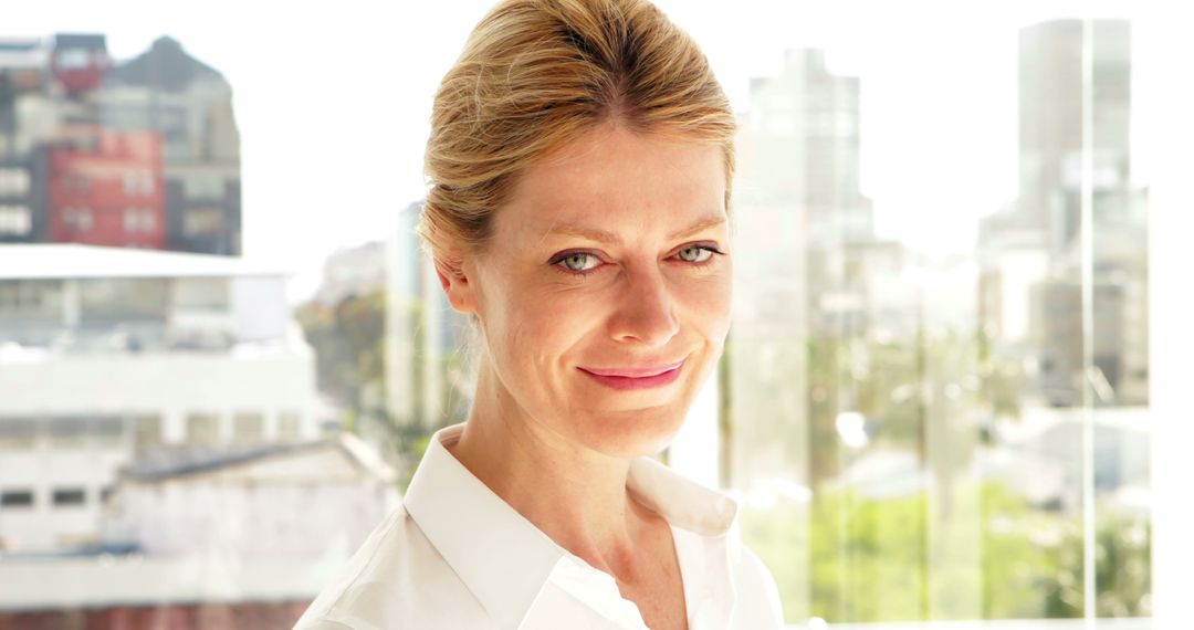 Confident Businesswoman Smiling Brightly in Modern Office