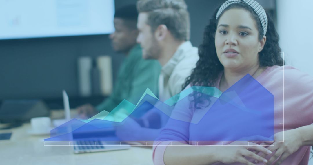 Businesswoman Analyzing Data with Graph Overlay in Office