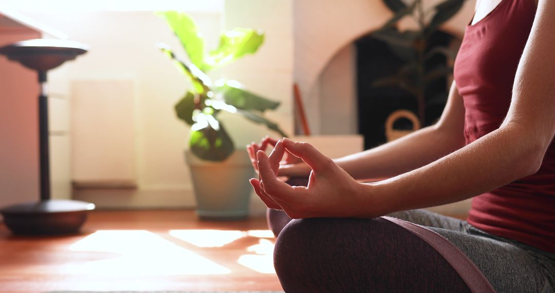 Young Woman Meditating at Home with Sunlight - Free Images, Stock Photos and Pictures on Pikwizard.com