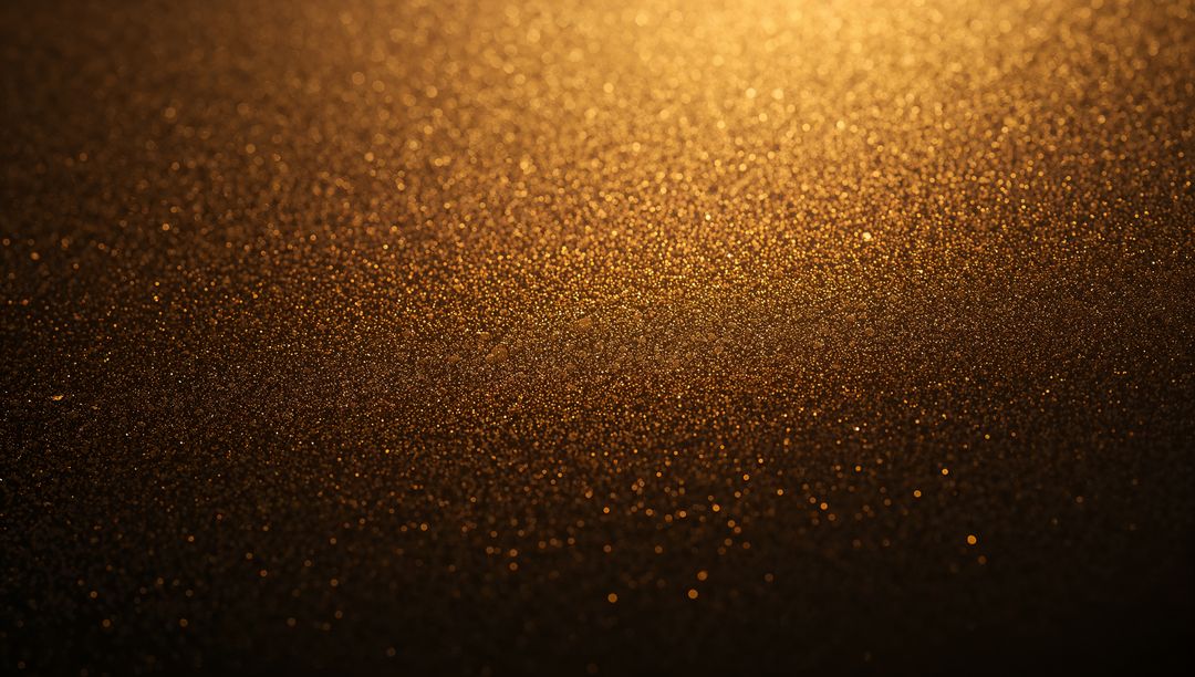Shimmering Golden Glitter Macro Texture with Warm Bokeh Highlights for Luxury Backgrounds