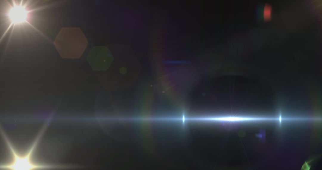 Dynamic Spotlight with Lens Flare on Dark Background