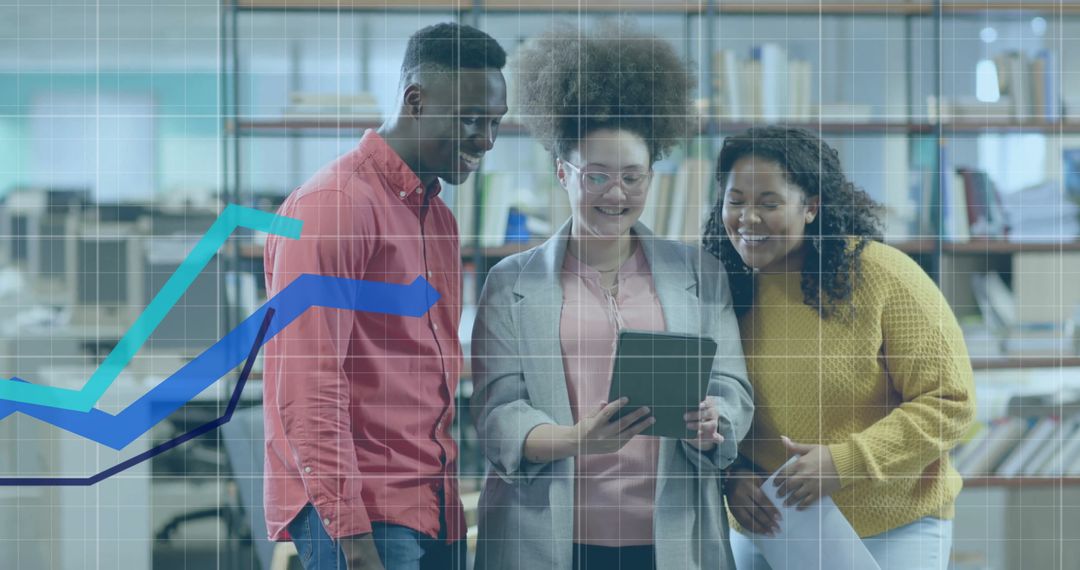 Diverse Team Analyzing Data with Tablet in Modern Office