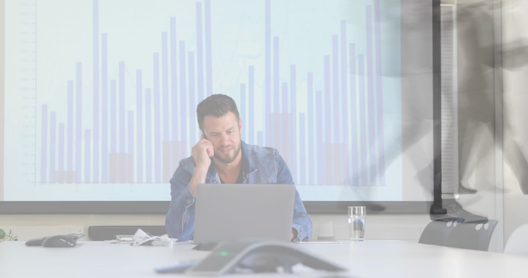 Businessman Analyzing Data with Blurred Robotics Figures