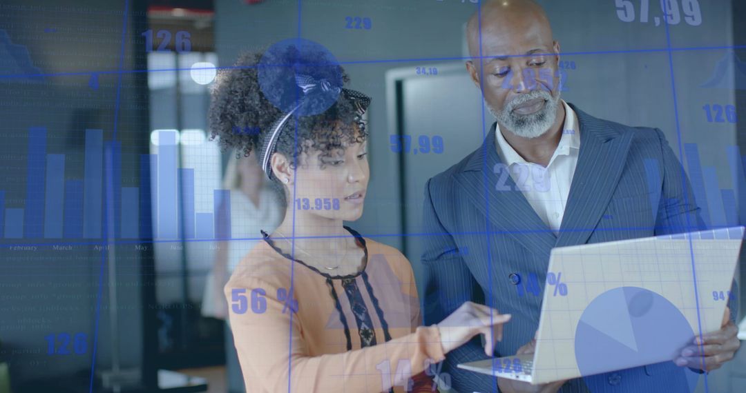 Business Team Analyzing Data Visualization with Technology