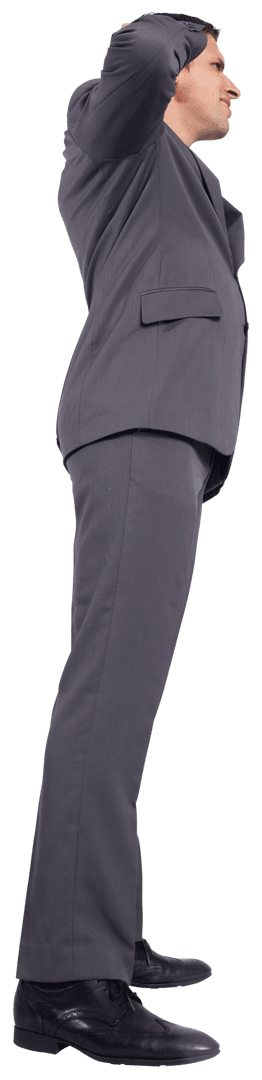 Caucasian Businessman Standing Confidently with Hands Behind Head