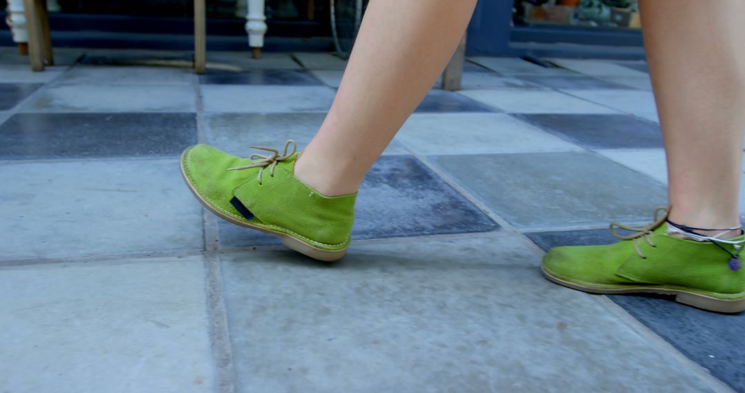 Caucasian woman walking and wearing green shoes in city - Free Images, Stock Photos and Pictures on Pikwizard.com