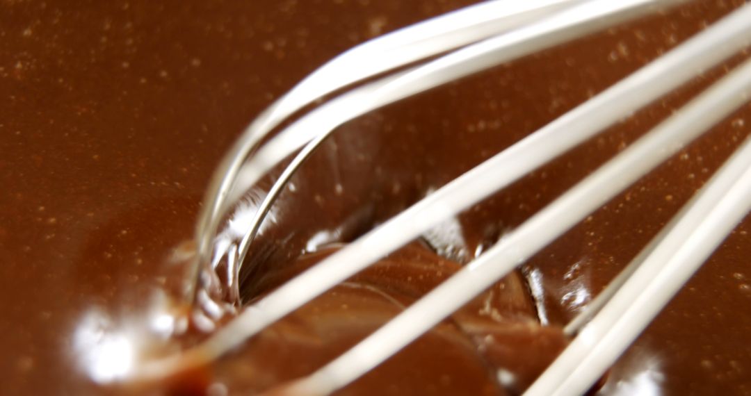 Close-Up of Whisk Mixing Creamy Chocolate Batter for Baking - Free Images, Stock Photos and Pictures on Pikwizard.com