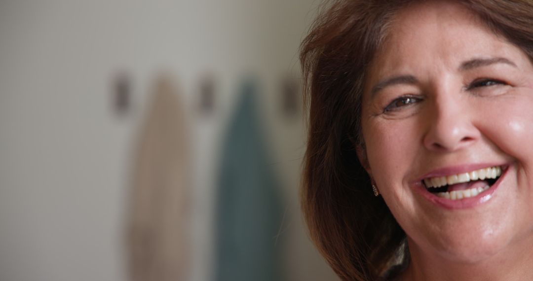 Senior Woman Smiling in Home Bathroom Highlighting Joy and Wellbeing