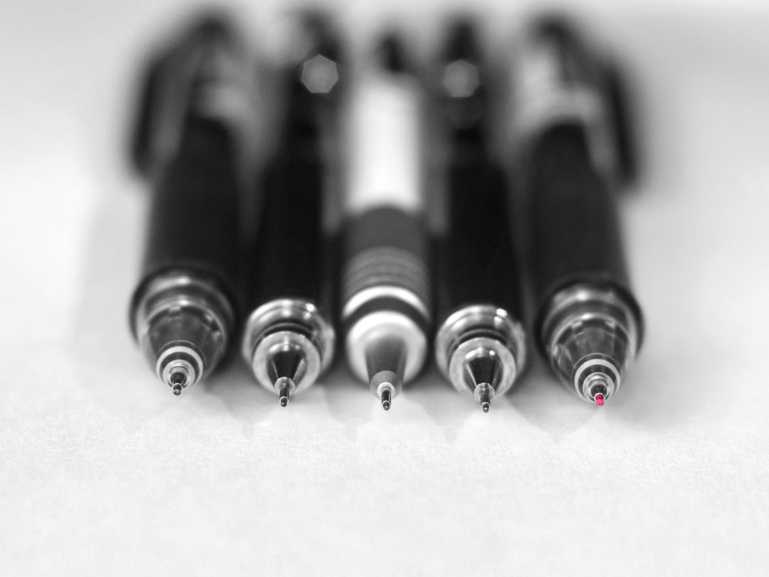 Close-Up of Five Assorted Pens on White Background - Free Images, Stock Photos and Pictures on Pikwizard.com