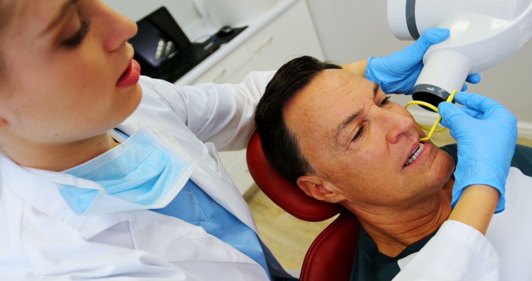 Dentist Preparing Patient for Dental X-Ray - Free Images, Stock Photos and Pictures on Pikwizard.com