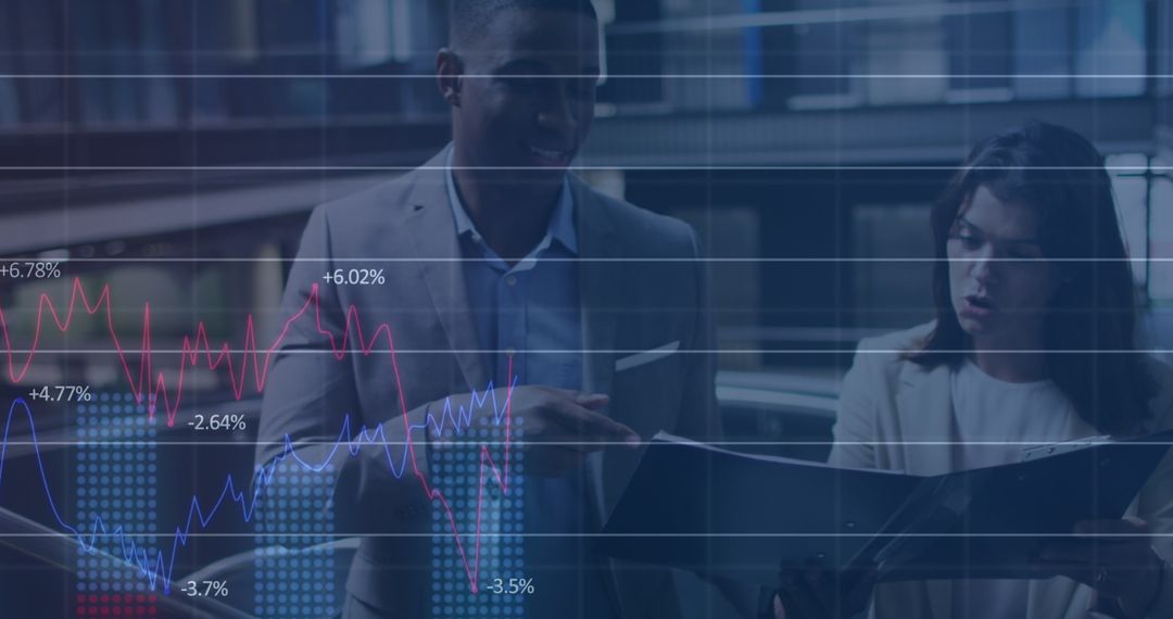 Business Team Analyzing Financial Data with Digital Graphs Overlay