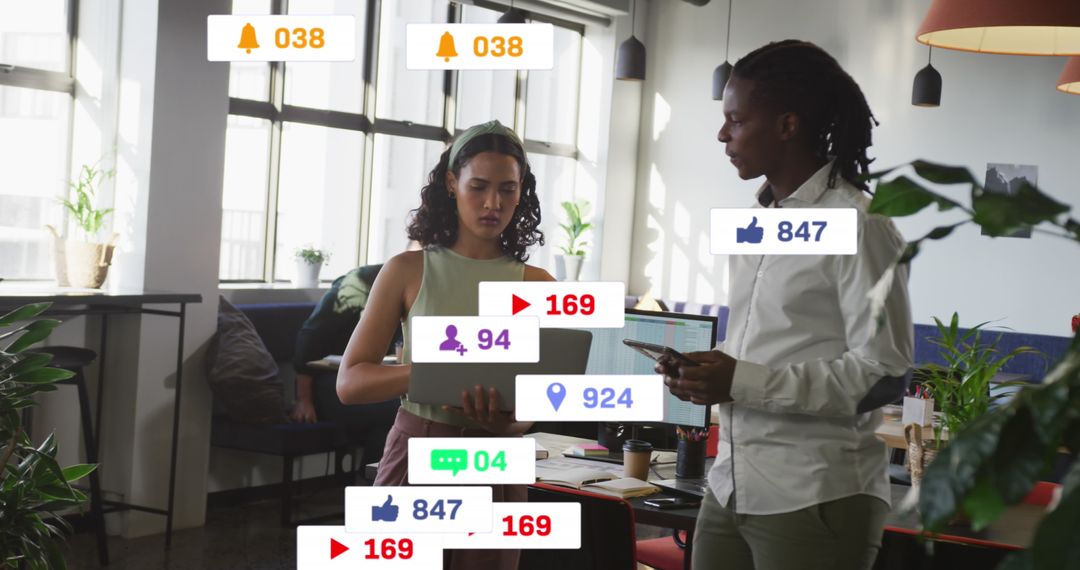 Diverse Coworkers Discussing Digital Strategy in Modern Office