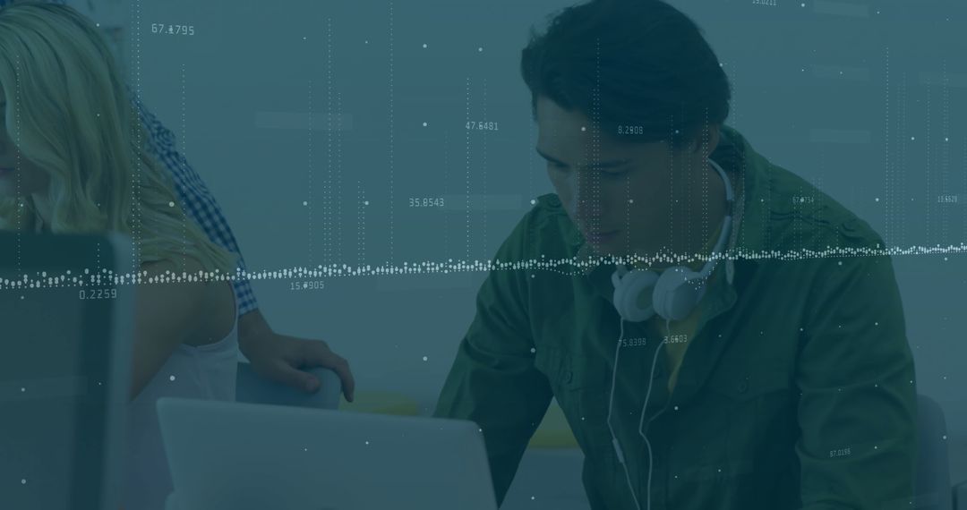 Business Team Analyzing Financial Data with Technology in Office