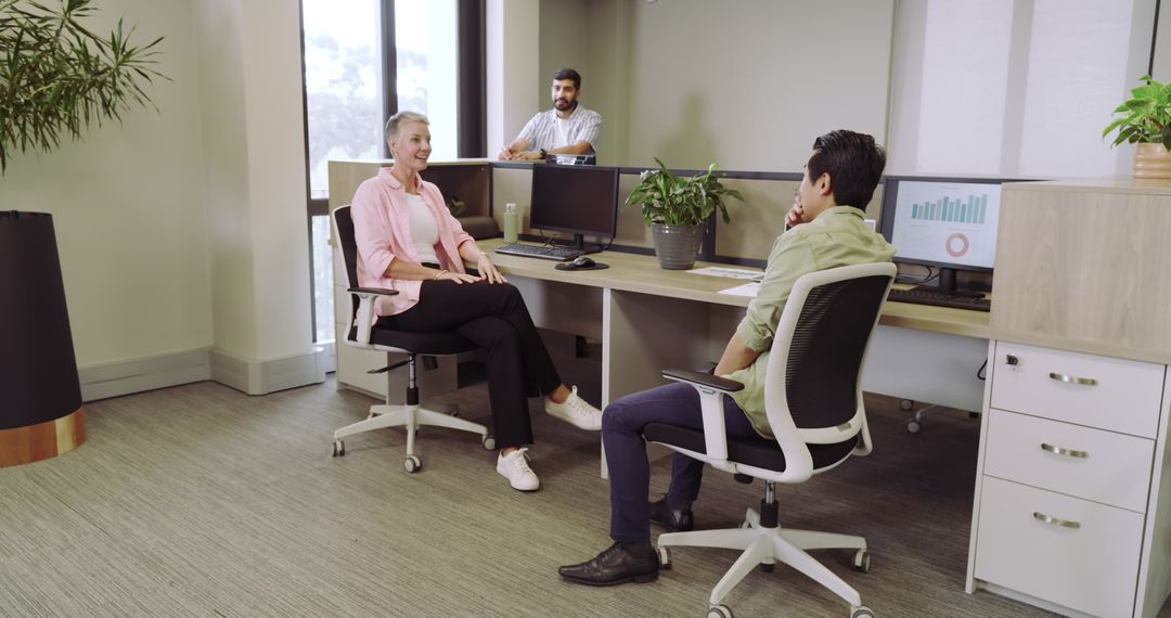 Diverse Team Engaging in Productive Office Collaboration