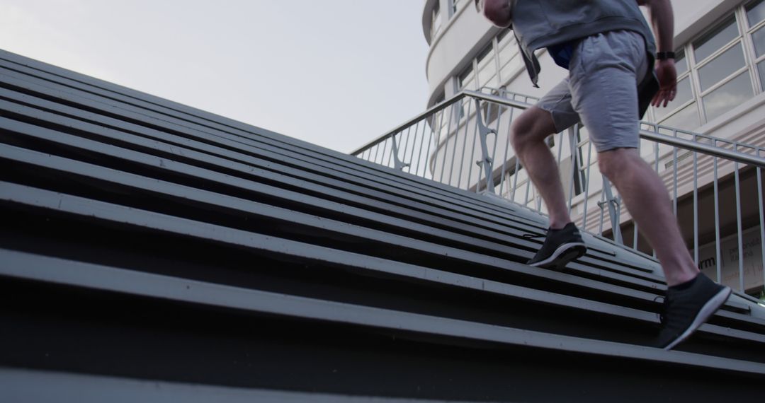 Runner Climbing Urban Stairs for Fitness Training - Free Images, Stock Photos and Pictures on Pikwizard.com